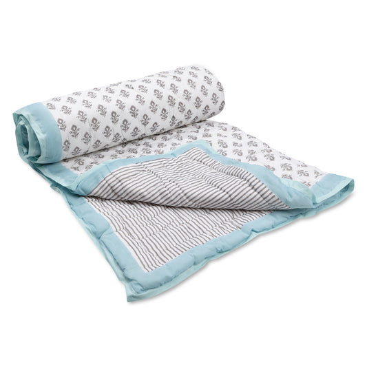 Keya and Blue Quilted Blanket